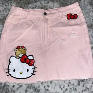 distressed pastel pink hello kitty / sanrio denim mini skirt